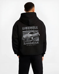 Black hoodie worn by a male model, back view, featuring Toyota 86 drift slammed street racing performance motorsport graphic.