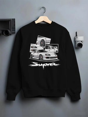 Black crewneck sweatshirt on a hanger against a grey wall, featuring Toyota Supra turbo turbocharged jdm street classic graphic.