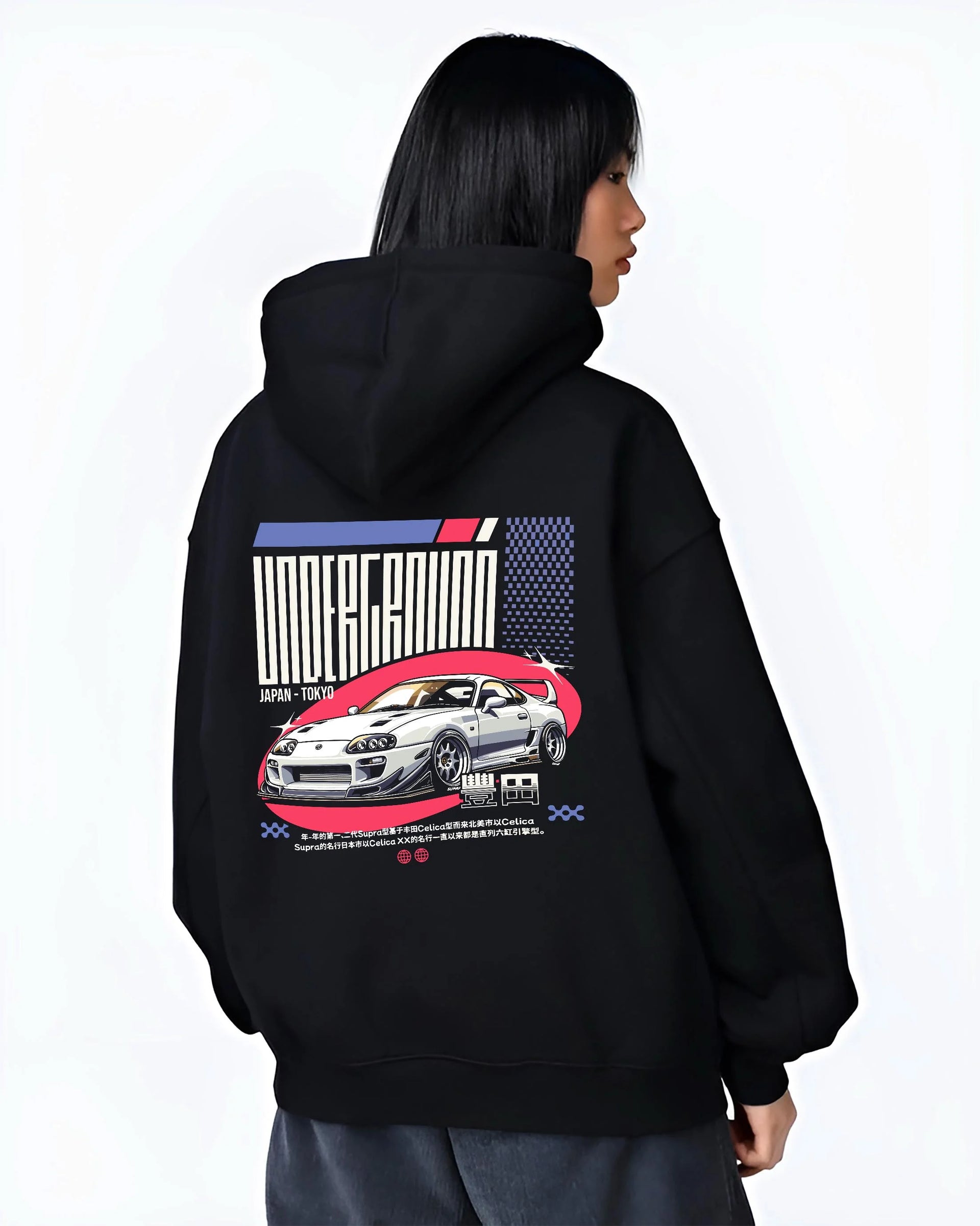 Black hoodie worn by a female model, back view, featuring Toyota Supra drift tokyo underground tokyo drift racing street graphic.