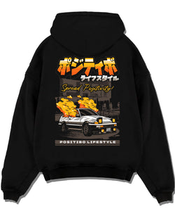 Black pullover hoodie laid flat on a white background, featuring Toyota AE86 drift jdm racing street performance motorsport graphic.
