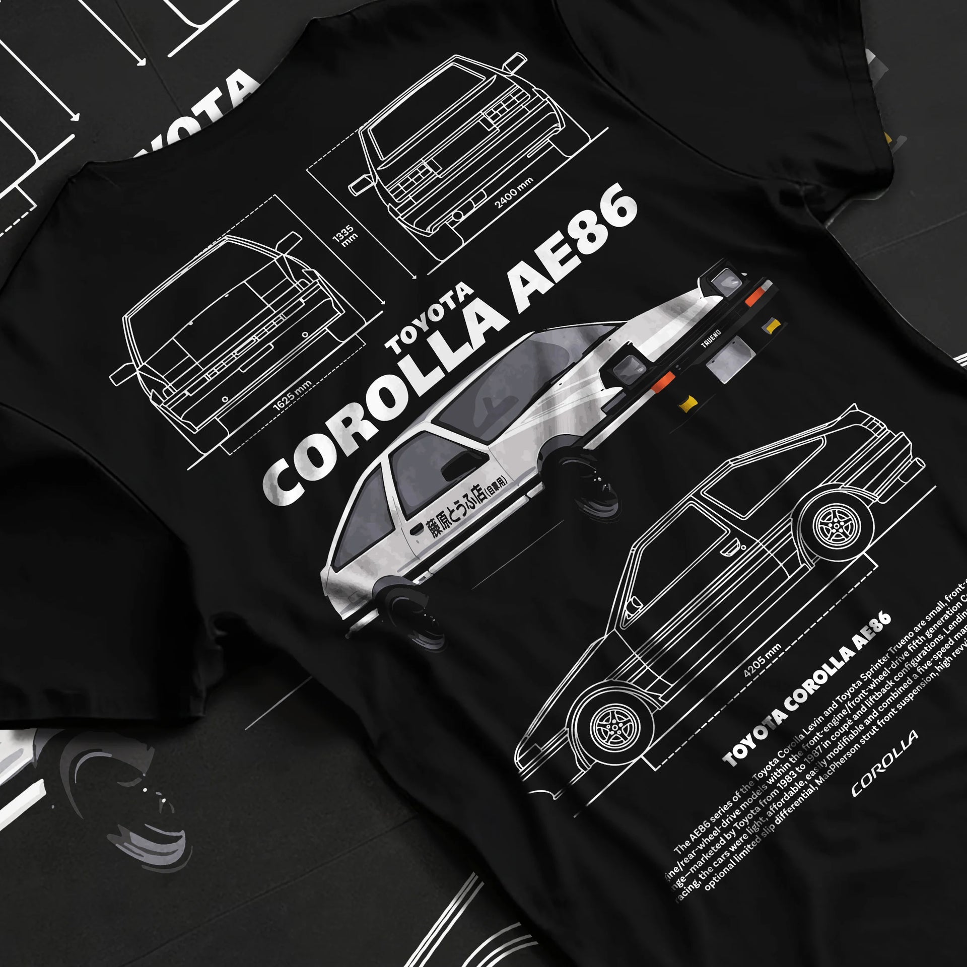 Black T-shirt laid flat with natural fabric folds, featuring Toyota AE86 drift legend racing street performance motorsport graphic.