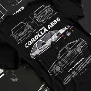 Black T-shirt laid flat with natural fabric folds, featuring Toyota AE86 drift legend racing street performance motorsport graphic.