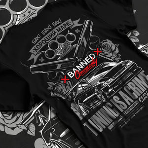 Black T-shirt laid flat with natural fabric folds, featuring Toyota Supra JZA80 supra turbo racing drift jdm stance graphic.