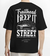 Black T-shirt worn by a male model, back view, featuring rs racing race street enthusiast performance motorsport automotive graphic.