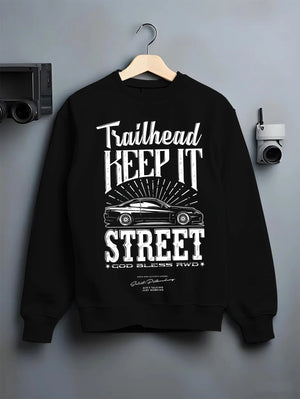 Black crewneck sweatshirt on a hanger against a grey wall, featuring rs racing race street enthusiast performance graphic.