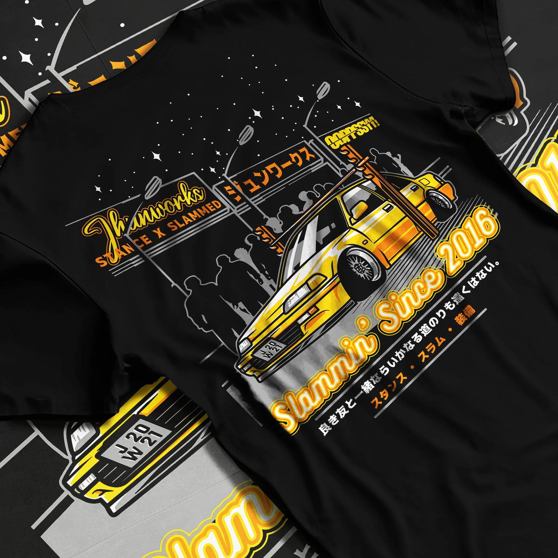 Black T-shirt laid flat with natural fabric folds, featuring Honda rs type r racing motorsport jdm street performance graphic.