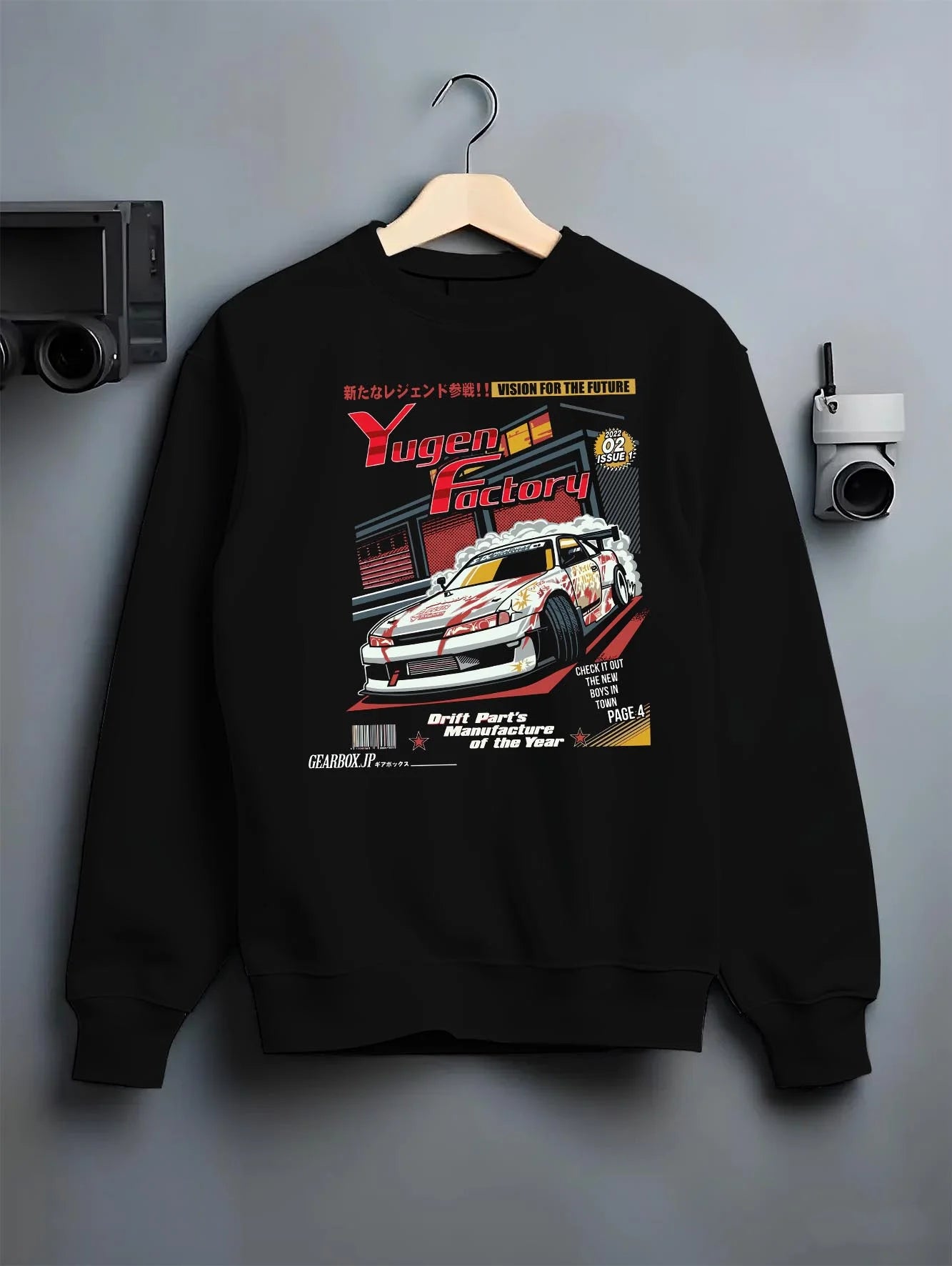 Black crewneck sweatshirt on a hanger against a grey wall, featuring rs racing drift motorsport jdm street legend graphic.