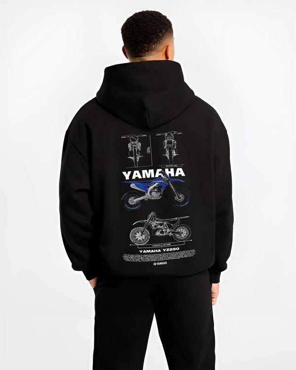 Black hoodie worn by a male model, back view, featuring Yamaha YZ250 racing street enthusiast performance motorsport graphic.