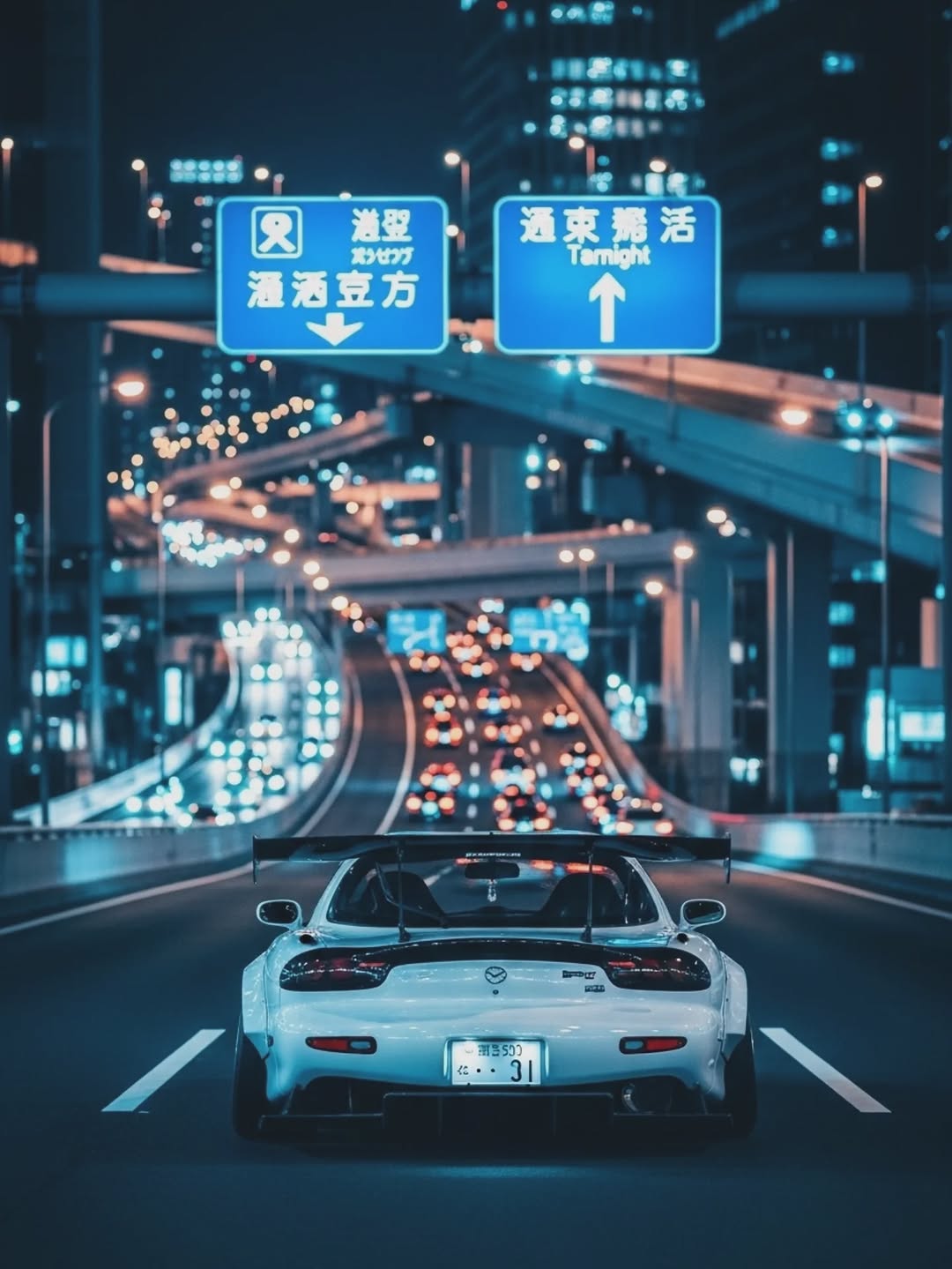 White Mazda RX-7 FD driving through Tokyo expressway at night, JDM street scene aesthetic for Trackhead Apparel.